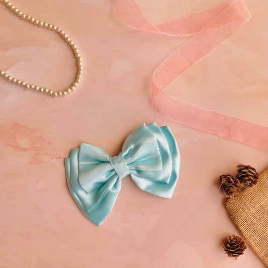Ocean Blue Triple Layer Hair Bow by RedBerry Cuddle. A refreshing and elegant hair accessory featuring a triple-layered bow design in a vibrant ocean blue shade, crafted from high-quality fabric for a secure and stylish look.