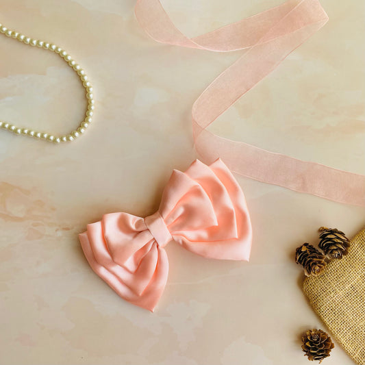 Flamingo Pink Triple Layer Hair Bow by RedBerry Cuddle. A vibrant and stylish hair accessory featuring a triple-layered bow design in a lively flamingo pink shade, crafted from high-quality fabric for a secure and eye-catching look.