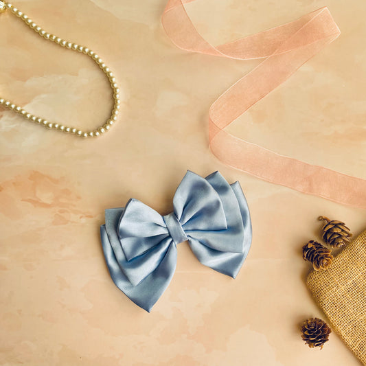 Glaucous Blue Triple Layer Hair Bow by RedBerry Cuddle. A soft and elegant hair accessory featuring a triple-layered bow design in a muted glaucous blue shade, crafted from high-quality fabric for a secure and graceful look.