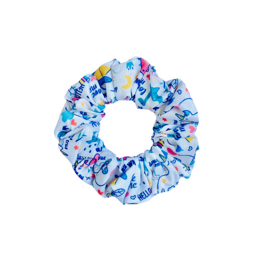 Magic Doodle Scrunchie by RedBerry Cuddle. A playful and artistic hair accessory featuring a whimsical doodle-inspired design, crafted from high-quality fabric for a secure and stylish hold.