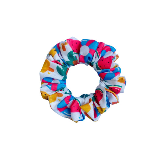 Sunny Beach Doodle Scrunchie by RedBerry Cuddle. A fun and vibrant hair accessory featuring a playful beach-themed doodle design, crafted from high-quality fabric for a secure and stylish hold.