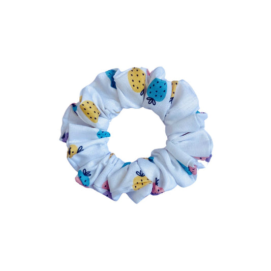 Strawberry Scrunchie by RedBerry Cuddle. A sweet and charming hair accessory featuring a delightful strawberry-themed design, crafted from high-quality fabric for a secure and stylish hold.