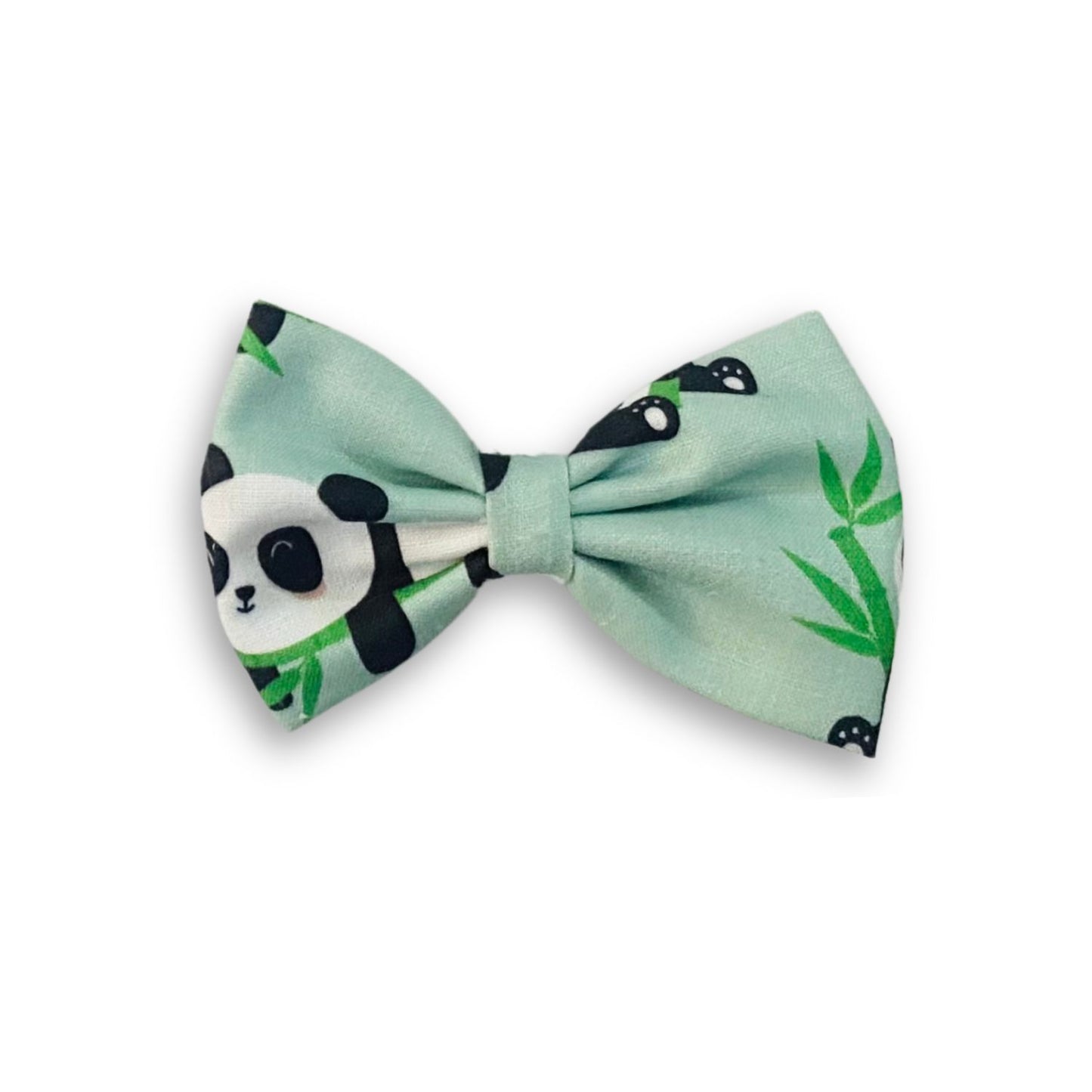 Panda Classic Hair Bow by RedBerry Cuddle. A cute and stylish hair accessory featuring a classic bow with an adorable panda-inspired design, crafted from high-quality fabric for a secure and charming look.