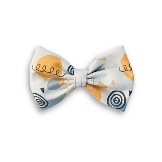 Doodle Classic Hair Bow by RedBerry Cuddle. A fun and artistic hair accessory featuring a classic bow with a playful doodle-inspired design, crafted from high-quality fabric for a secure and stylish look.