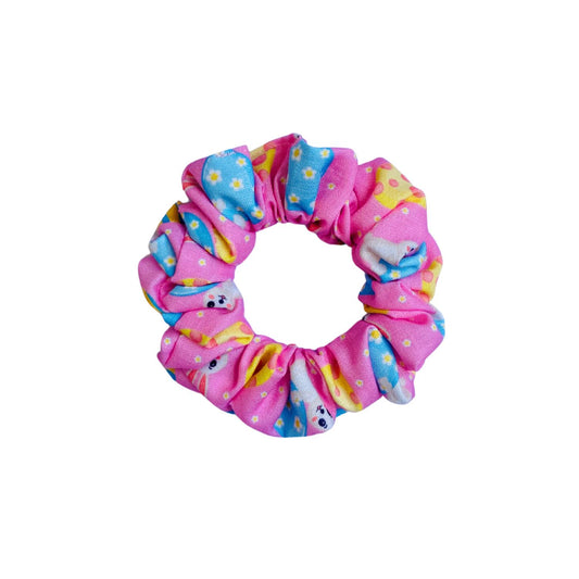 Easter Egg Pink Scrunchie by RedBerry Cuddle. A festive and charming hair accessory featuring a soft pink hue with a delightful Easter egg-inspired design, crafted from high-quality fabric for a secure and stylish hold.