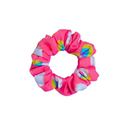 Rainbow Scrunchie by RedBerry Cuddle. A vibrant and colorful hair accessory featuring a cheerful rainbow-inspired design, crafted from high-quality fabric for a secure and stylish hold.