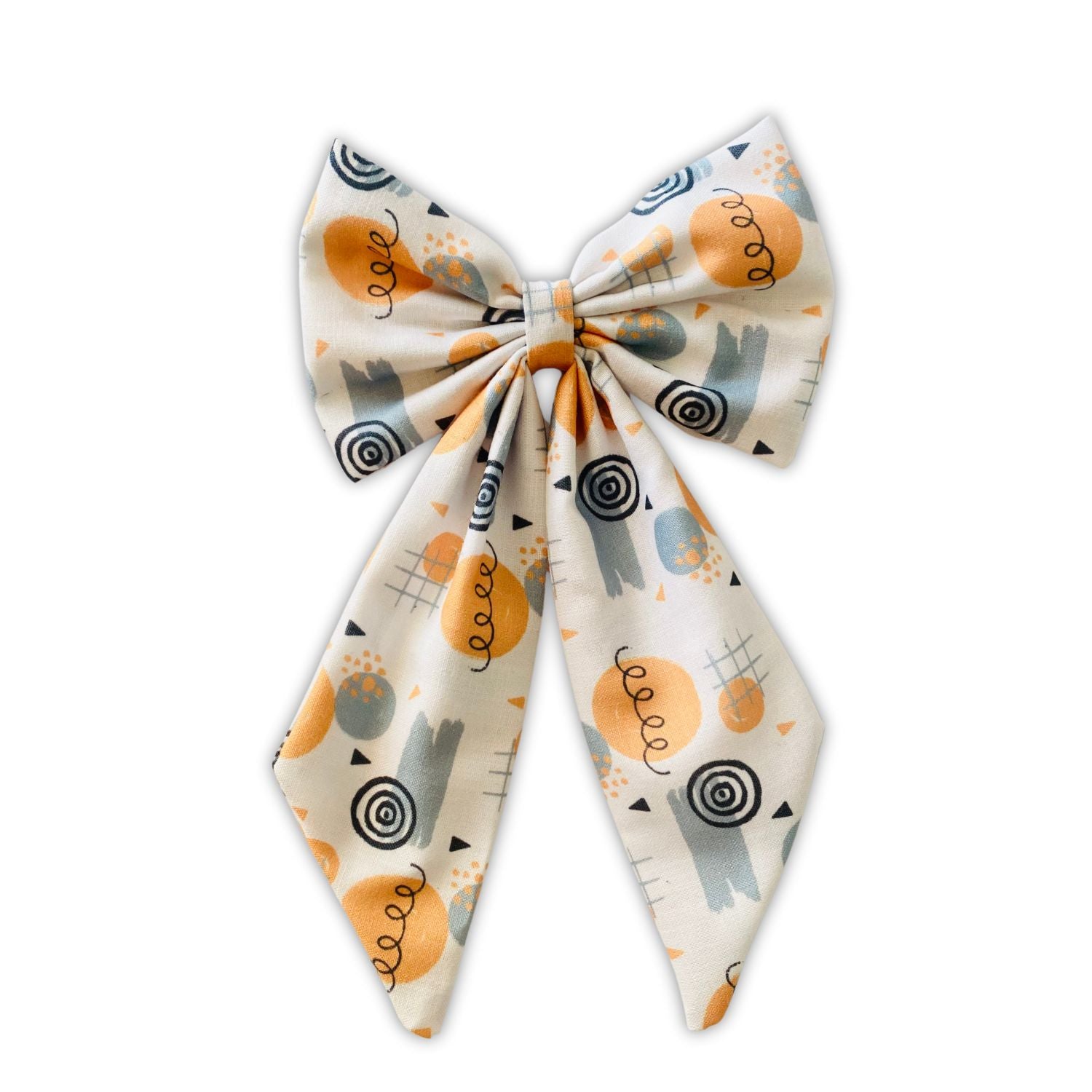 Doodle Midi Tail Hair Bow by RedBerry Cuddle. A fun and artistic hair accessory featuring a midi-length bow with a playful doodle-inspired design, crafted from high-quality fabric for a secure and stylish look.