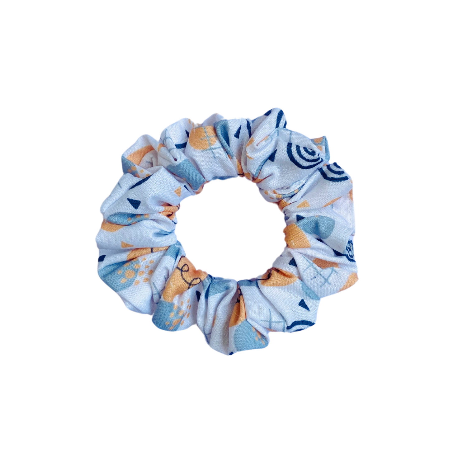 Doodle Scrunchie by RedBerry Cuddle. A fun and artistic hair accessory featuring a playful doodle-inspired design, crafted from high-quality fabric for a secure and stylish hold.