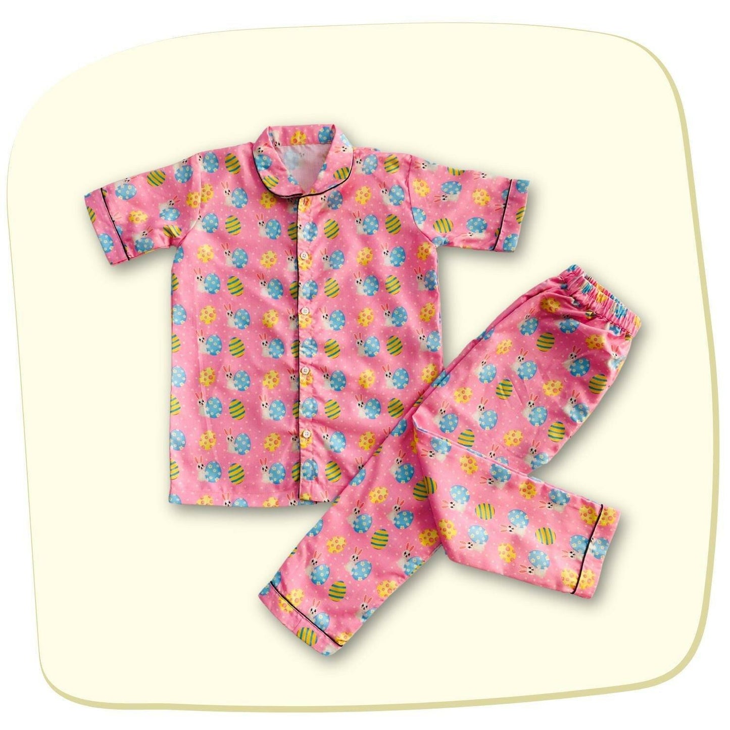 Easter Egg Pink Pajama Set by RedBerry Cuddle, made from 100% cotton. A soft and cozy unisex pajama set in a cheerful pink hue, designed for kids to enjoy comfortable sleep.